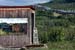 Alaska Pipeline and the Artic Circle Inn at mile 130 of the Dalton Highway