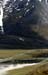 Alaska Pipeline with 18 wheeler creating a cloud of dust on the Dalton Highwya in Brooks Range